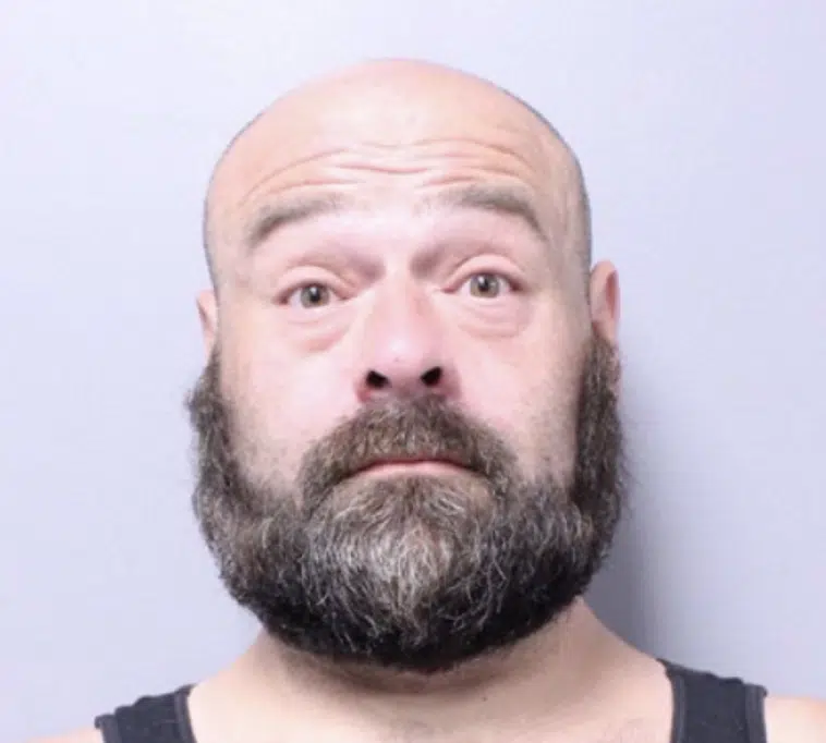 Man sets vehicle on fire during standoff in Brutus